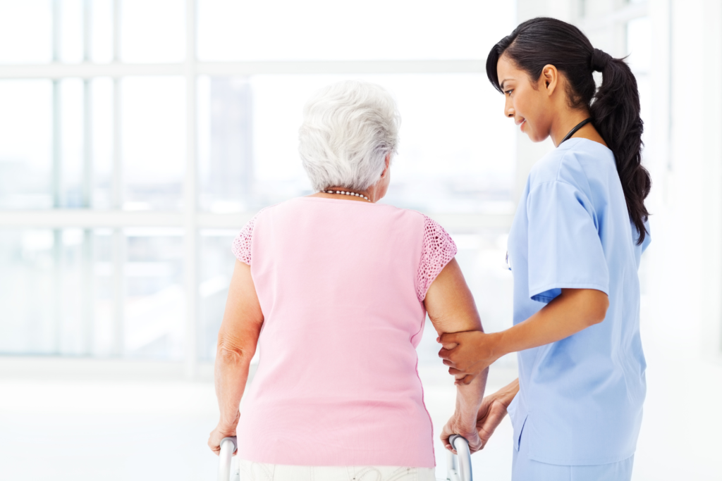 Nurse working with female elderly patient